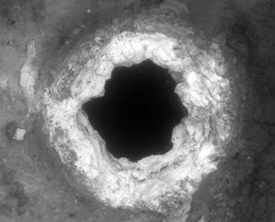 black and white image of hole