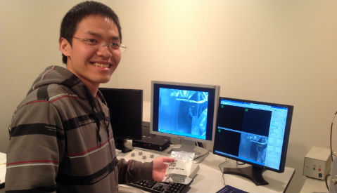 SIU student at computer in lab